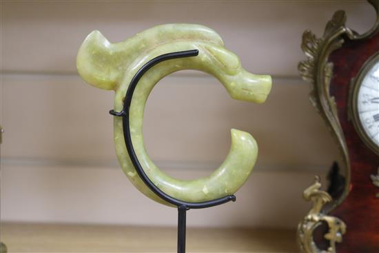 A Chinese yellow carved stone pendant